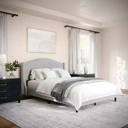 Letto a piattaforma imbottito Amelia con testiera curva e sponde imbottite